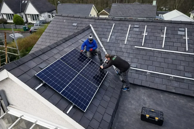 High-efficiency solar panel array installation in progress